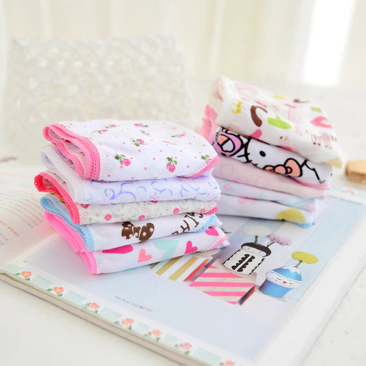 Folded girls underwear in pastel colors and assorted prints