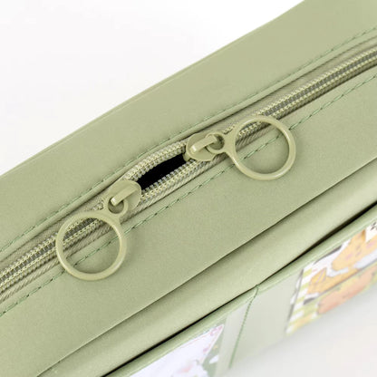 Close-up of green pencil case zipper and front pocket