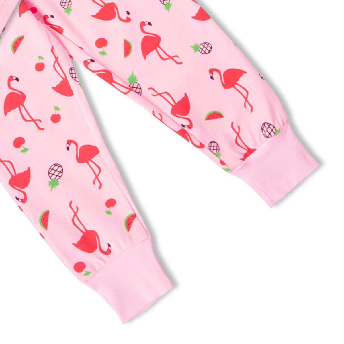 Close-up of pink pajama fabric with flamingo print