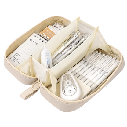 Cream white pencil case opened to show compartments and stationery