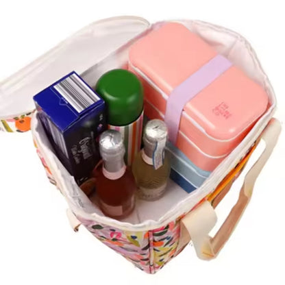 Open lunch bag showing foil-style lining and packed containers