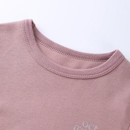 Pink kids base layer neckline and stitching close-up