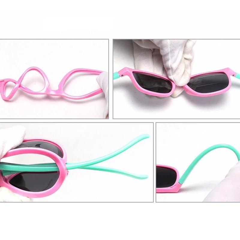 Pink kids sunglasses showing front, frame and arm details