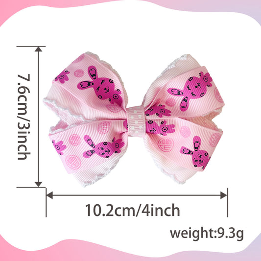 Pink printed bow hair clip with width and height measurements